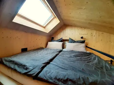 Ein Bett oder Betten in einem Zimmer der Unterkunft Rausblick Cabin