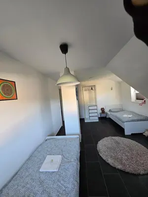 Ein Bett oder Betten in einem Zimmer der Unterkunft Urlaubsoase mit Panoramabalkon & Platz für 6 Personen