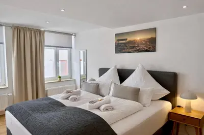 Ein Bett oder Betten in einem Zimmer der Unterkunft WINETIME - Apartment Sankt Martin für 2 Personen im Zentrum Luftkurort an der südlichen Weinstraße zwischen Neustadt und Landau