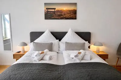 Ein Bett oder Betten in einem Zimmer der Unterkunft WINETIME - Apartment Sankt Martin für 2 Personen im Zentrum Luftkurort an der südlichen Weinstraße zwischen Neustadt und Landau