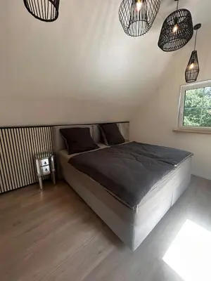 Ein Bett oder Betten in einem Zimmer der Unterkunft das HAUS