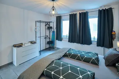 Ein Bett oder Betten in einem Zimmer der Unterkunft Wohlfühlnest St Leon Rot Aufzug Klima Balkon