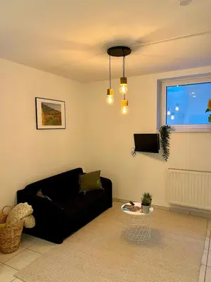 TV/Unterhaltungsangebot in der Unterkunft Moderne Souterrainwohnung