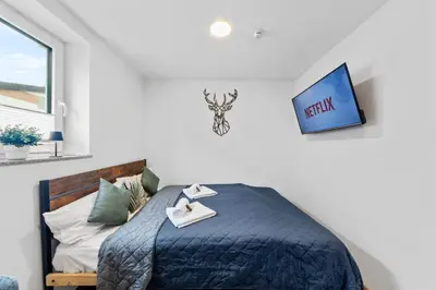 Ein Bett oder Betten in einem Zimmer der Unterkunft Weinkiste - VINoKAT Living