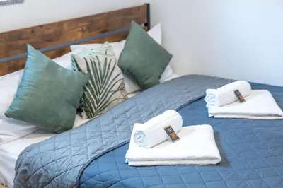 Ein Bett oder Betten in einem Zimmer der Unterkunft Weinkiste - VINoKAT Living