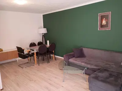 Ein Sitzbereich in der Unterkunft Gästezimmer-Dieburg