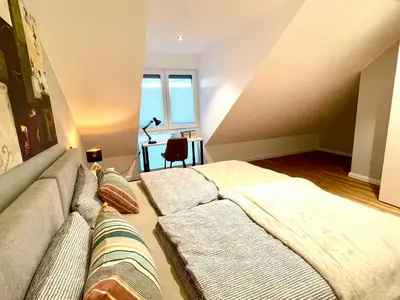 Ein Bett oder Betten in einem Zimmer der Unterkunft Smart Living Worms
