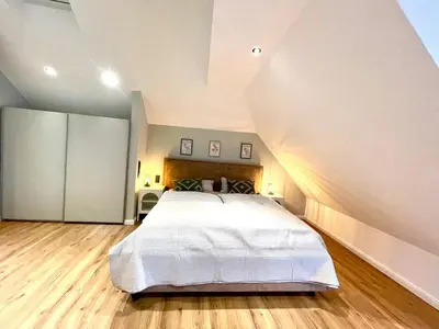 Ein Bett oder Betten in einem Zimmer der Unterkunft Smart Living Worms