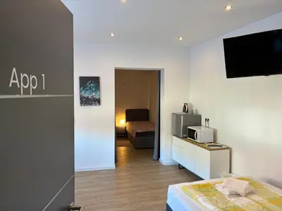 Ein Bett oder Betten in einem Zimmer der Unterkunft Pension zur Linde