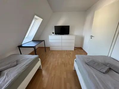 Ein Bett oder Betten in einem Zimmer der Unterkunft GEM01 Apartment near Heilbronn