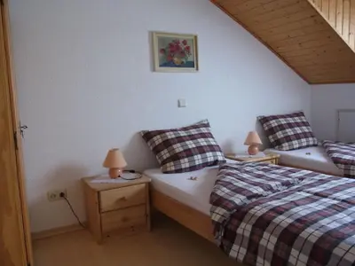 Ein Bett oder Betten in einem Zimmer der Unterkunft Guesthouse König