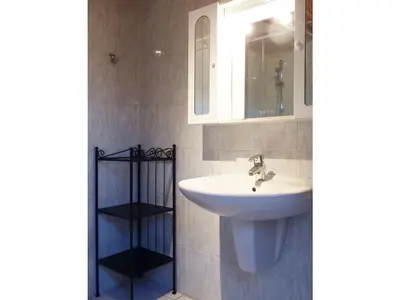 Ein Badezimmer in der Unterkunft Guesthouse König