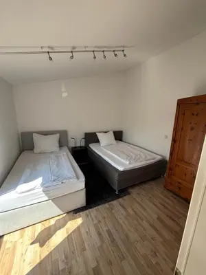 Ein Bett oder Betten in einem Zimmer der Unterkunft 3 Room Apartment