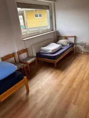 Ein Bett oder Betten in einem Zimmer der Unterkunft Country Comfort Stay 4 Bedrooms near Frankfurt