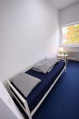 Ein Bett oder Betten in einem Zimmer der Unterkunft Country Comfort Stay 4 Bedrooms near Frankfurt
