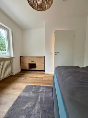 Ein Bett oder Betten in einem Zimmer der Unterkunft StayPfalz Apartment - 3 Zimmer & Parkplatz