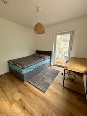 Ein Bett oder Betten in einem Zimmer der Unterkunft StayPfalz Apartment - 3 Zimmer & Parkplatz