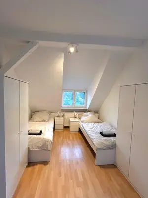 Ein Bett oder Betten in einem Zimmer der Unterkunft Monteurs- und Ferienwohnung Miltenberg
