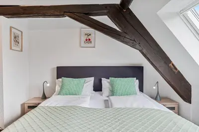 Ein Bett oder Betten in einem Zimmer der Unterkunft Charmante Hotelwohnung nahe Pforzheim, ruhige Lage