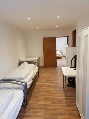 Ein Bett oder Betten in einem Zimmer der Unterkunft Augustenburgstr 34 Karlsruhe Whg 10