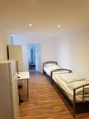 Ein Bett oder Betten in einem Zimmer der Unterkunft Augustenburgstr 34 Karlsruhe Whg 10