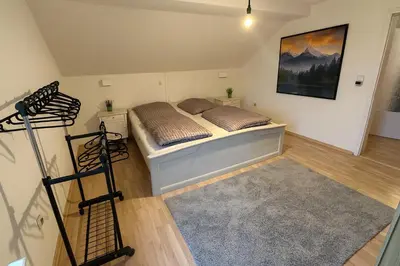 Ein Bett oder Betten in einem Zimmer der Unterkunft Tor zu Frankreich - Neuburg am Rhein