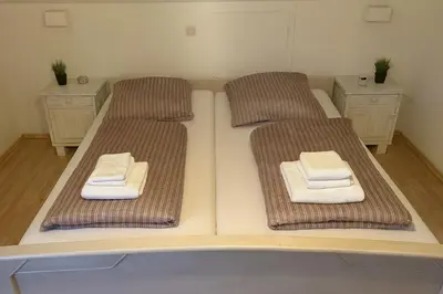 Ein Bett oder Betten in einem Zimmer der Unterkunft Tor zu Frankreich - Neuburg am Rhein