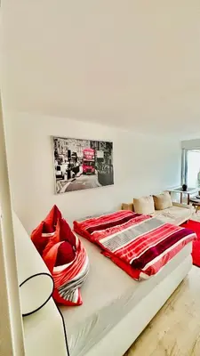 Ein Bett oder Betten in einem Zimmer der Unterkunft Eastside Apartment Karlsruhe