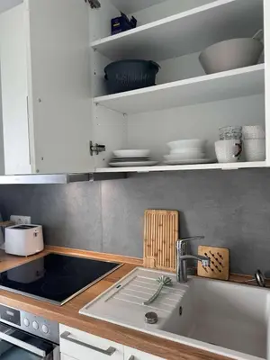 Küche/Küchenzeile in der Unterkunft Modernes Apartment - Kirchfeld