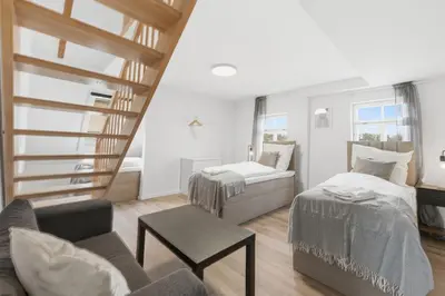 Ein Bett oder Betten in einem Zimmer der Unterkunft BackHome - MAISIONETTE - 120qm - Fantastische Schlosslage - SmartTV - Waschmaschine - Netflix - 24h Checkin- Apartment 4