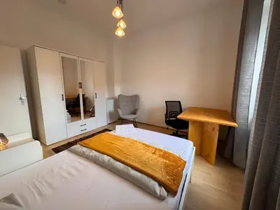 Ein Bett oder Betten in einem Zimmer der Unterkunft Apartment nahe Frankfurt am Main mit Parkplätzen PKW oder VAN