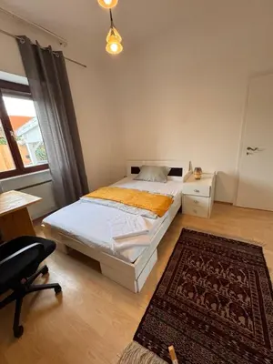 Ein Bett oder Betten in einem Zimmer der Unterkunft Apartment nahe Frankfurt am Main mit Parkplätzen PKW oder VAN