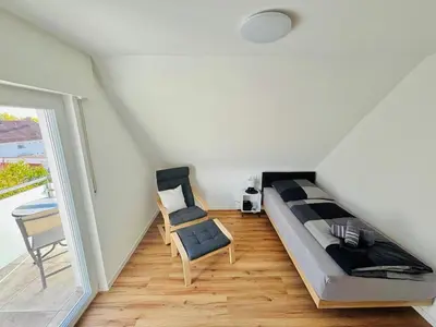 Ein Bett oder Betten in einem Zimmer der Unterkunft Schönblick modernes Gästehaus mit Panoramablick