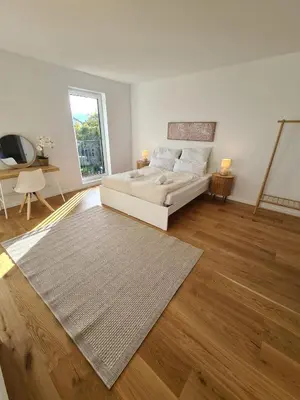 Ein Bett oder Betten in einem Zimmer der Unterkunft Modernes Neubauhaus ca 200 qm Nähe vom Flughafen