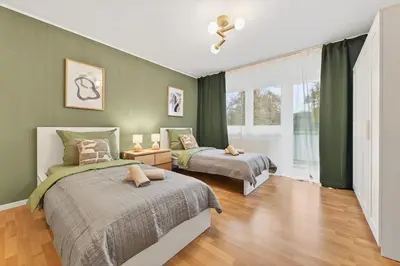 Ein Bett oder Betten in einem Zimmer der Unterkunft NEW Apartment Tina- 2-Zimmer, 4 Einzelbetten, Parkplatz