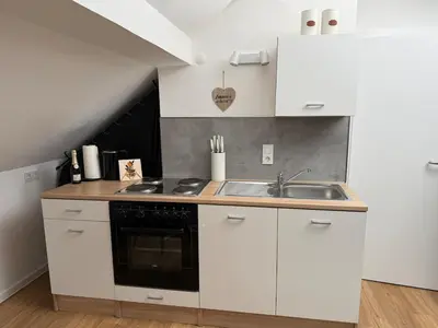 Küche/Küchenzeile in der Unterkunft 2 Zimmer Dachwohnung mit Burgblick und Kingsize Bett