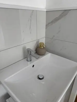 Ein Badezimmer in der Unterkunft 2 Zimmer Dachwohnung mit Burgblick und Kingsize Bett