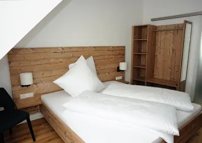 Ein Bett oder Betten in einem Zimmer der Unterkunft Gästehäusle in Mundelsheim