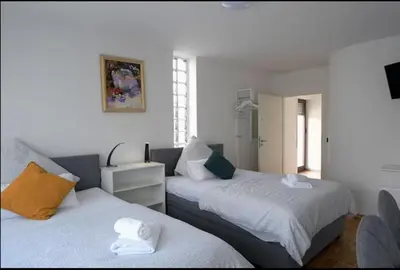 Ein Bett oder Betten in einem Zimmer der Unterkunft Western