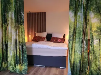 Ein Bett oder Betten in einem Zimmer der Unterkunft Stilvolles Studio mit Terrasse und Stellplatz