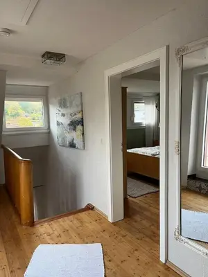 Ein Bett oder Betten in einem Zimmer der Unterkunft Ferienhaus Schönbachhof