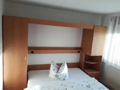 Ein Bett oder Betten in einem Zimmer der Unterkunft Gästezimmer Hagenschieß