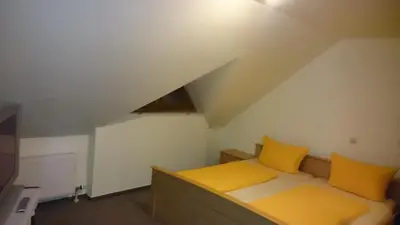 Ein Bett oder Betten in einem Zimmer der Unterkunft Schozacher Stüble