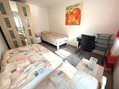 Ein Bett oder Betten in einem Zimmer der Unterkunft Unterkunft im Untergeschoss Platz für bis zu 4 Personen
