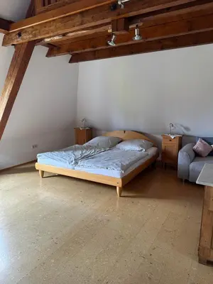Ein Bett oder Betten in einem Zimmer der Unterkunft Bioweingut Glaser