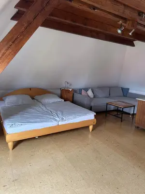 Ein Bett oder Betten in einem Zimmer der Unterkunft Bioweingut Glaser