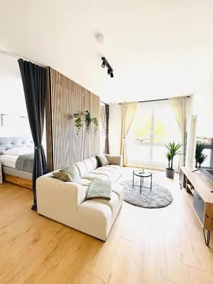 Ein Sitzbereich in der Unterkunft NIRO I Design City Apartment, Wellness, Infrarotkabine, Parkplatz, TV