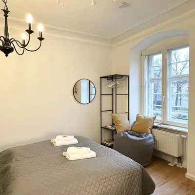 Ein Bett oder Betten in einem Zimmer der Unterkunft BELLA - Business&Family Ap 2, 100m zum Konzerteingang Schloß, Parkplatz, Smart TV, Netflix, Waschmaschine, 24h Checkin, 30 qm