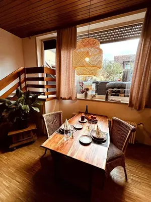 Ein Sitzbereich in der Unterkunft Ferienwohnung zum Woibauer