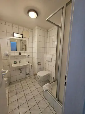 Ein Badezimmer in der Unterkunft Gästehaus Schröder